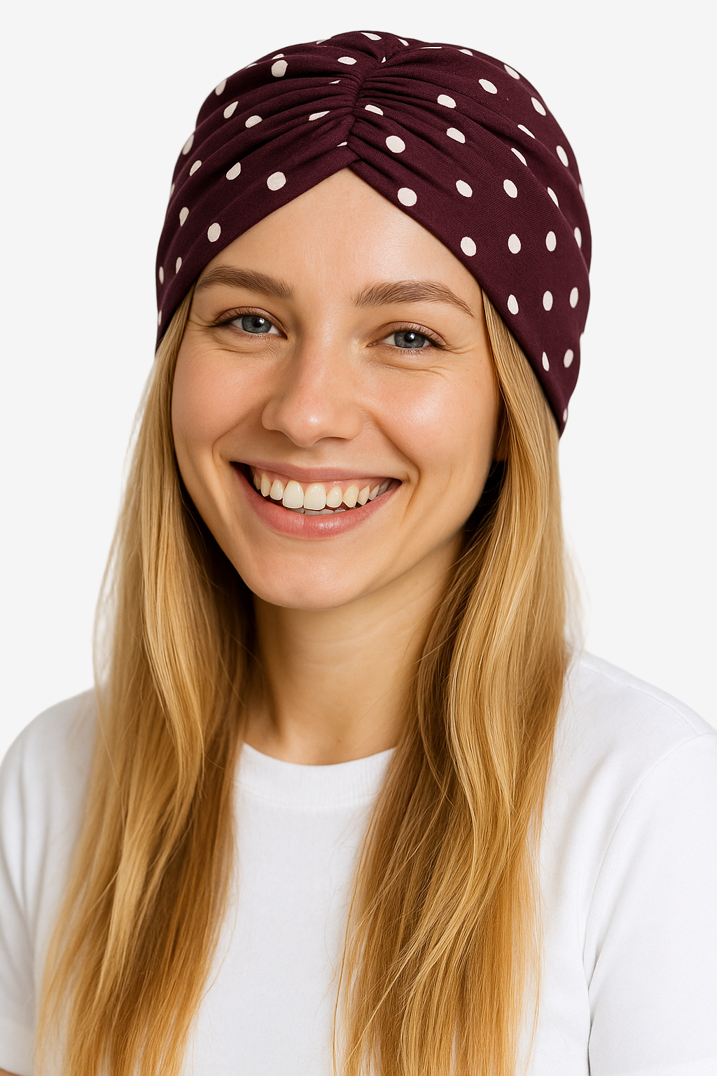 Woman wearing a burgundy headscarf with white polka dots on a white background