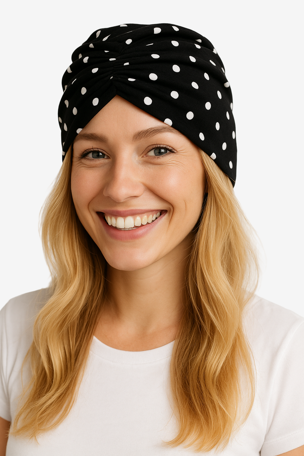 Woman wearing a black headscarf with white polka dots on a plain background