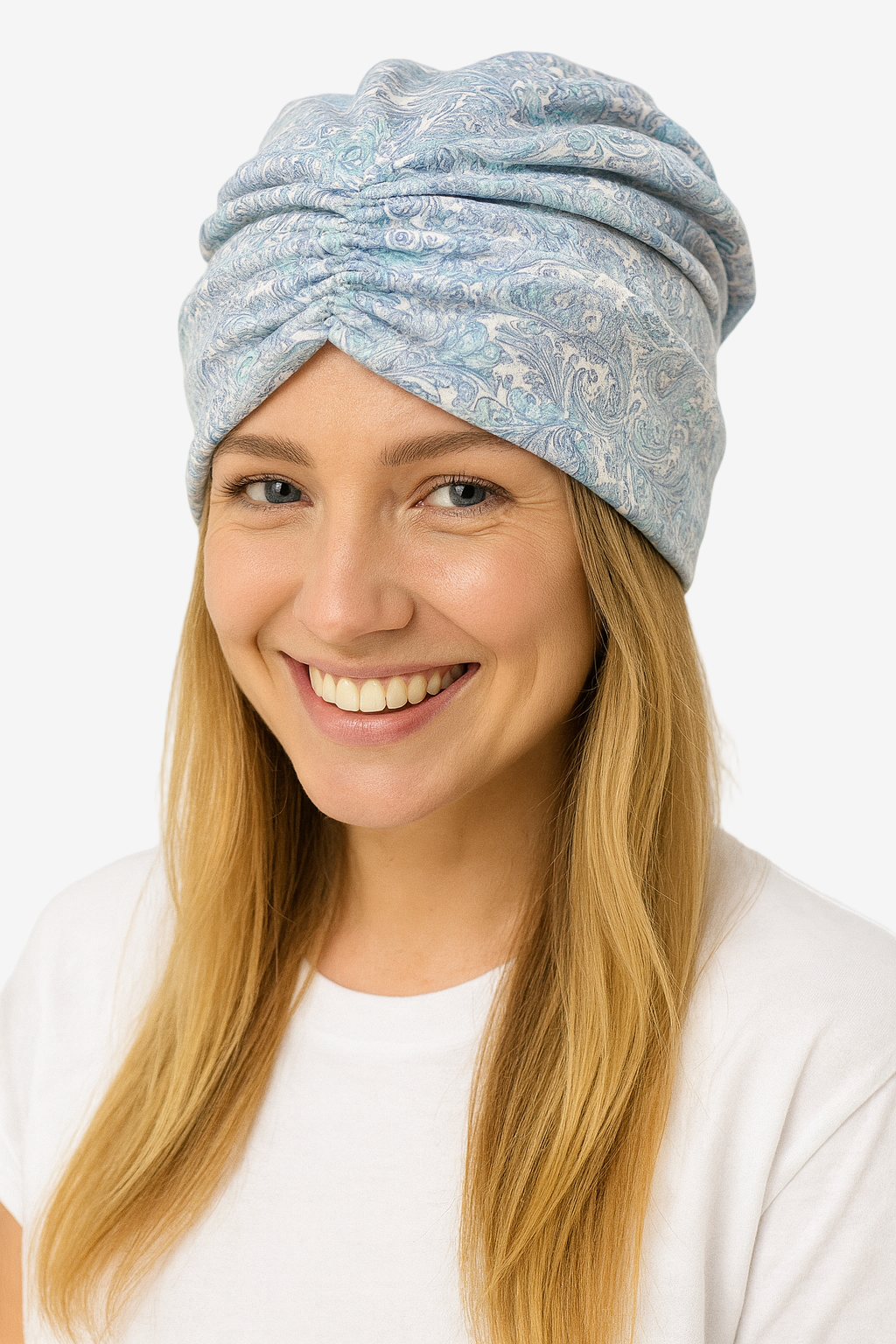 Woman wearing a light blue patterned headscarf on a white background